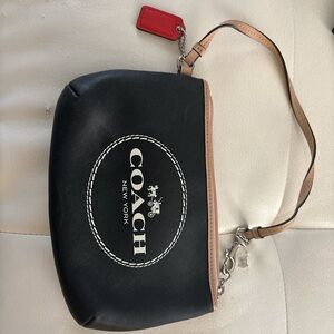 Coach Black and Tan Wristlet with Red Accent